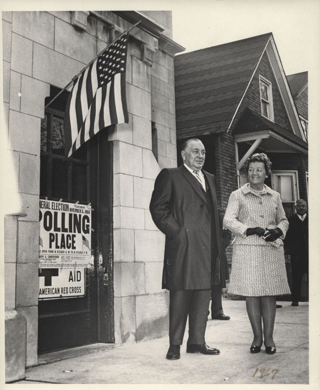 Miniature of Daleys standing outside their polling place