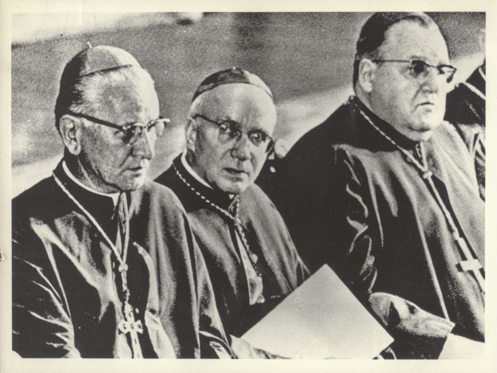 Cardinal Cody with clergy in Rome