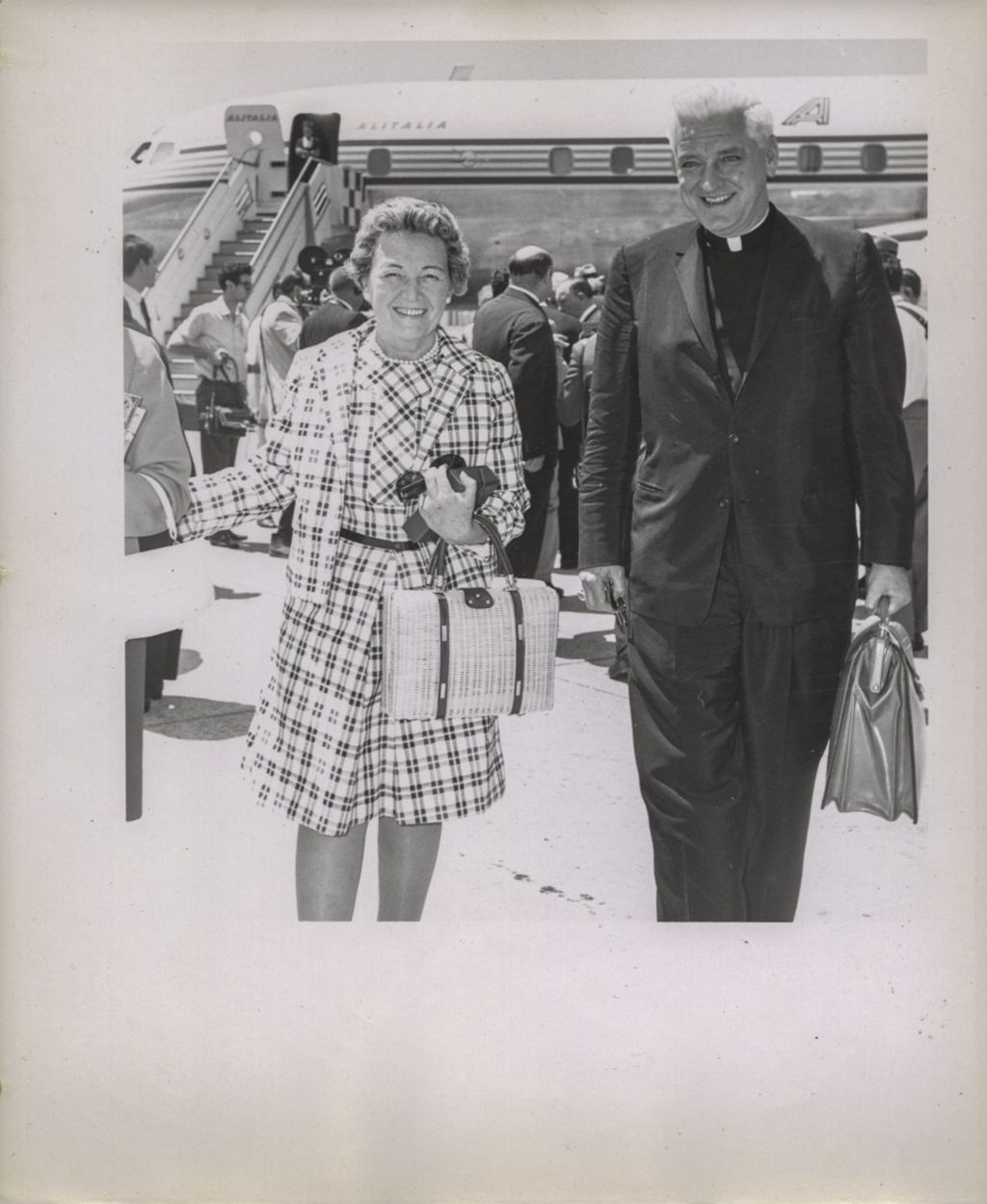 Miniature of Eleanor Daley and Bishop O'Donnell at Rome airport