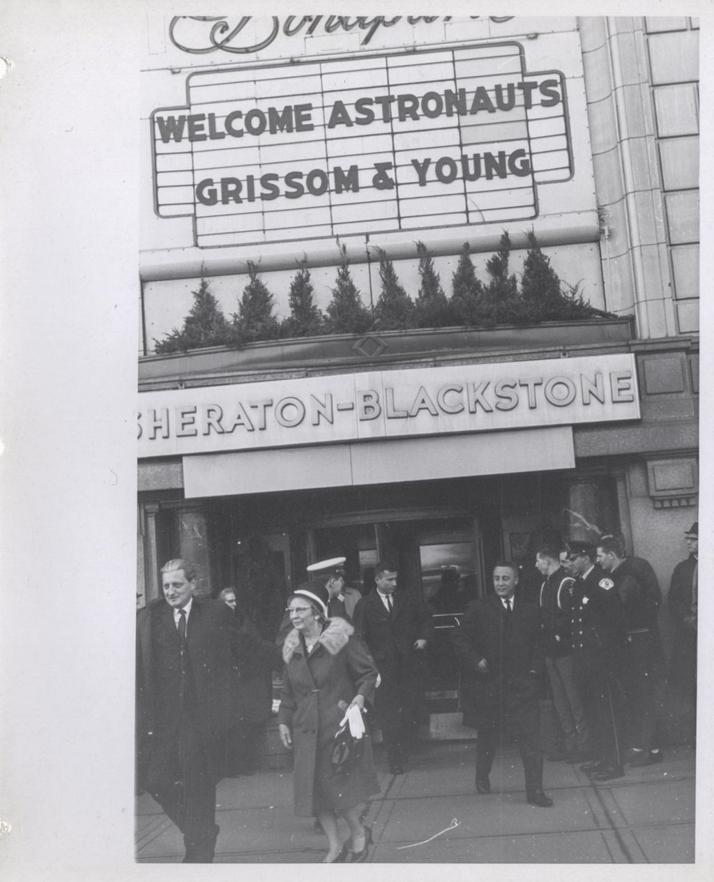 Astronauts Young and Grissom outside the Sheraton-Blackstone Hotel