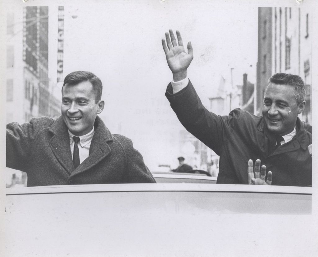 Miniature of Astronauts Young and Grissom waving to the crowd during a parade