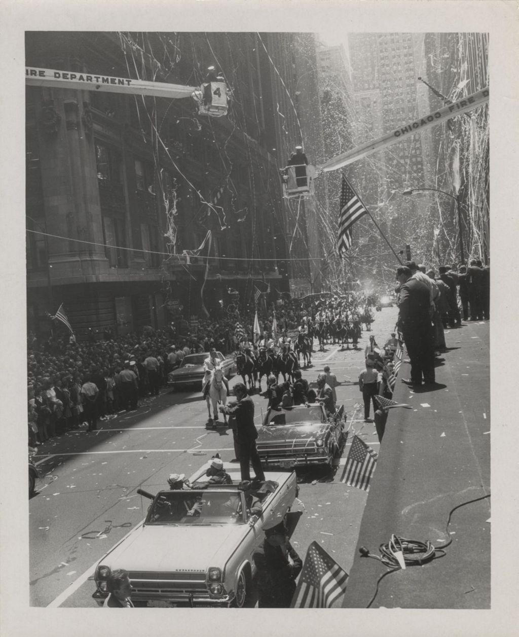 Miniature of Edward H. White, Hubert Humphrey and James McDivitt in a parade for the astronauts