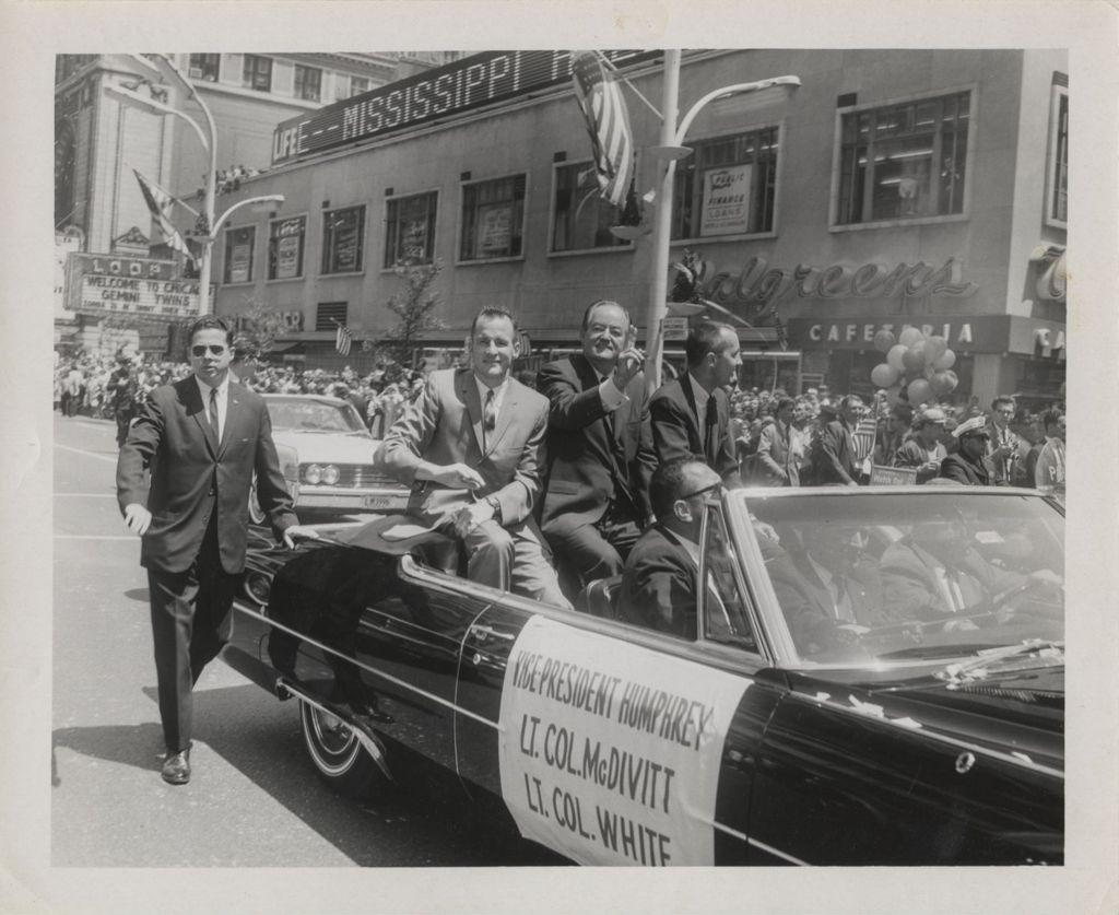 James McDivitt, Hubert Humphrey, and Edward H. White in a parade in the astronauts' honor