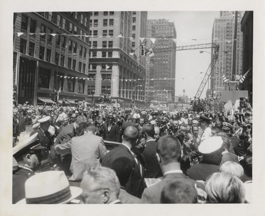 Crowd at a parade for astronauts McDIvitt and White