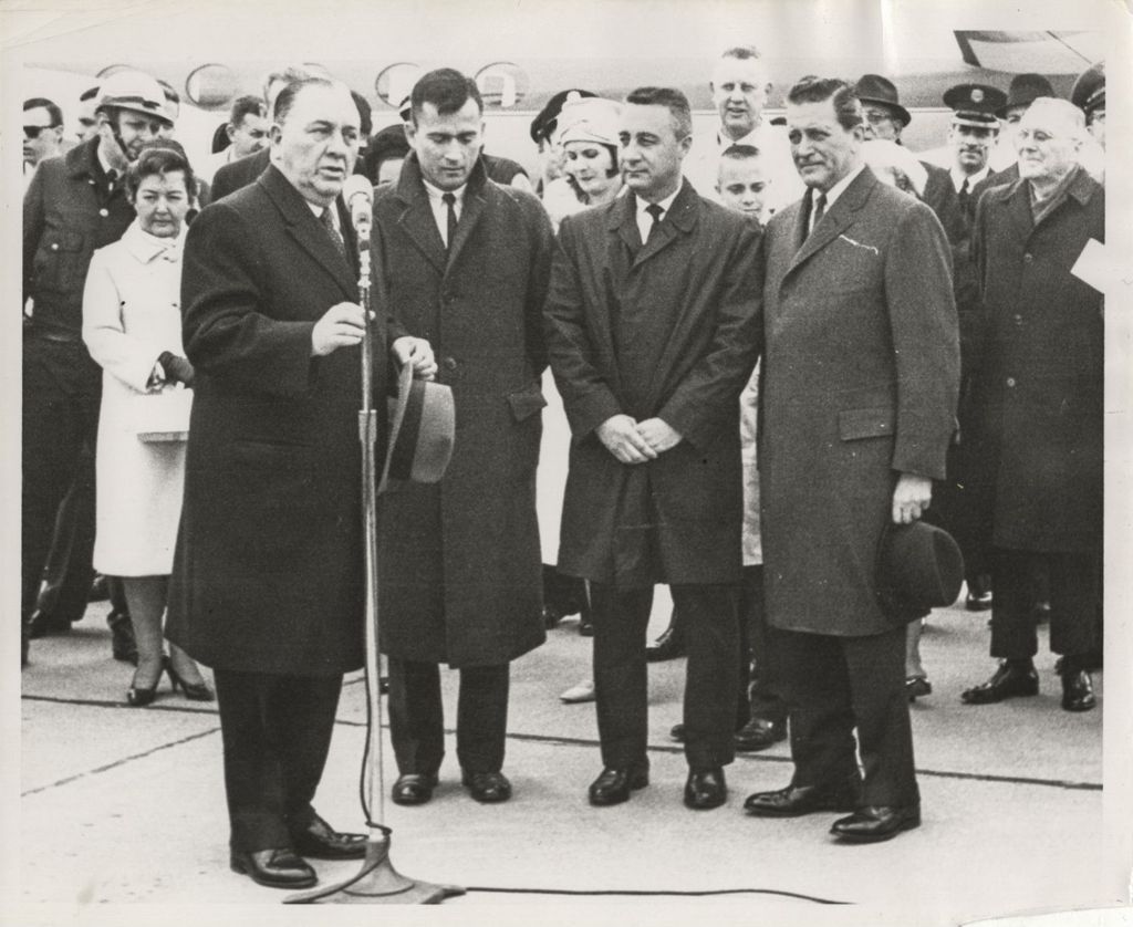 Richard J. Daley and Otto Kerner with astronauts John Young and Gus Grissom at O'Hare airport