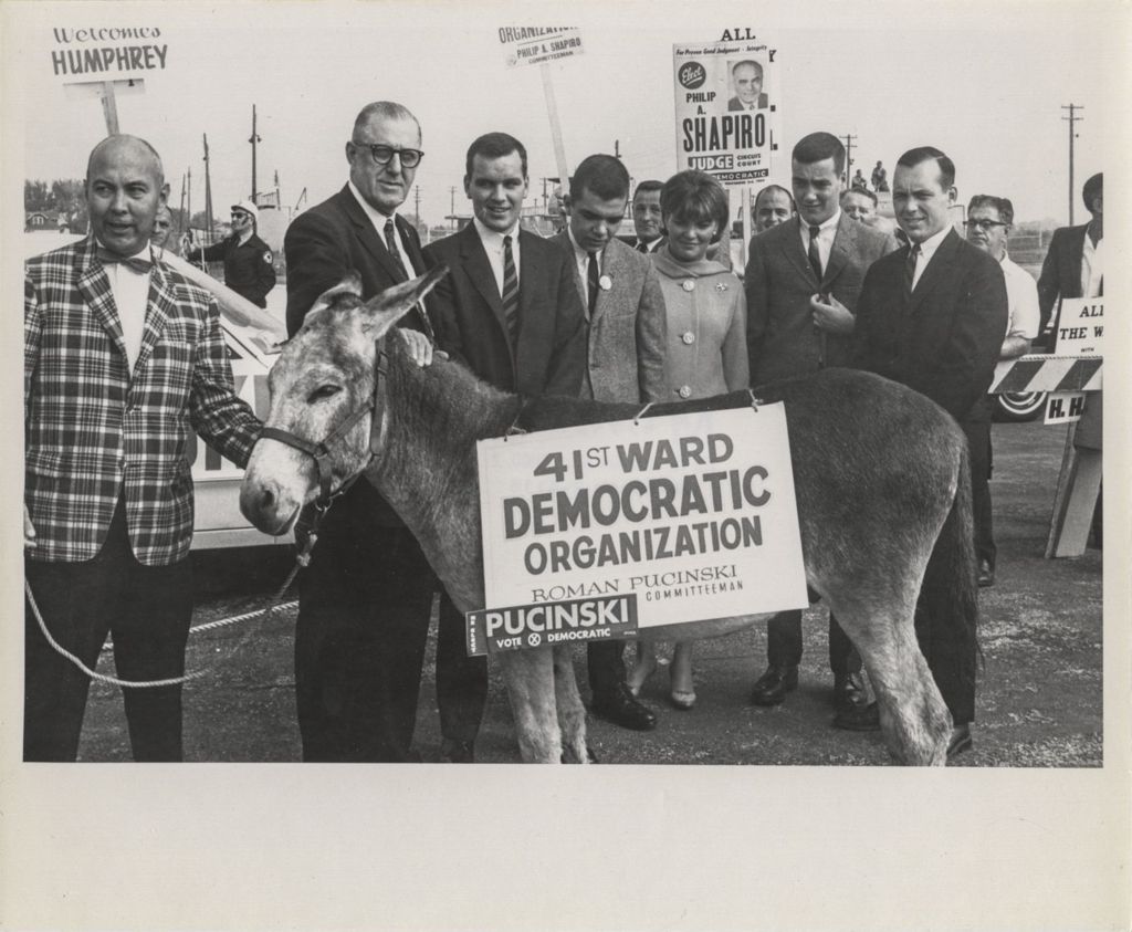 Daley family members and others with a Democratic donkey