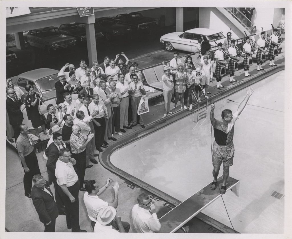 Miniature of Dan Rostenkowski and supporters at a poolside event