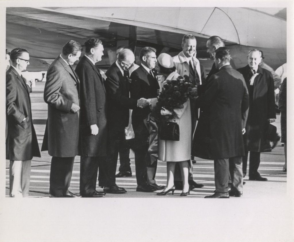 Lady Bird Johnson and Lyndon B. Johnson in airport receiving line