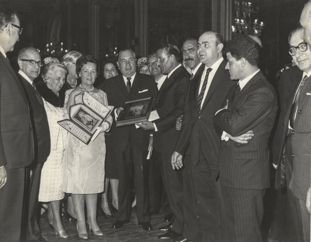 Richard J. Daley and Eleanor Daley accept gifts at a reception in Rome