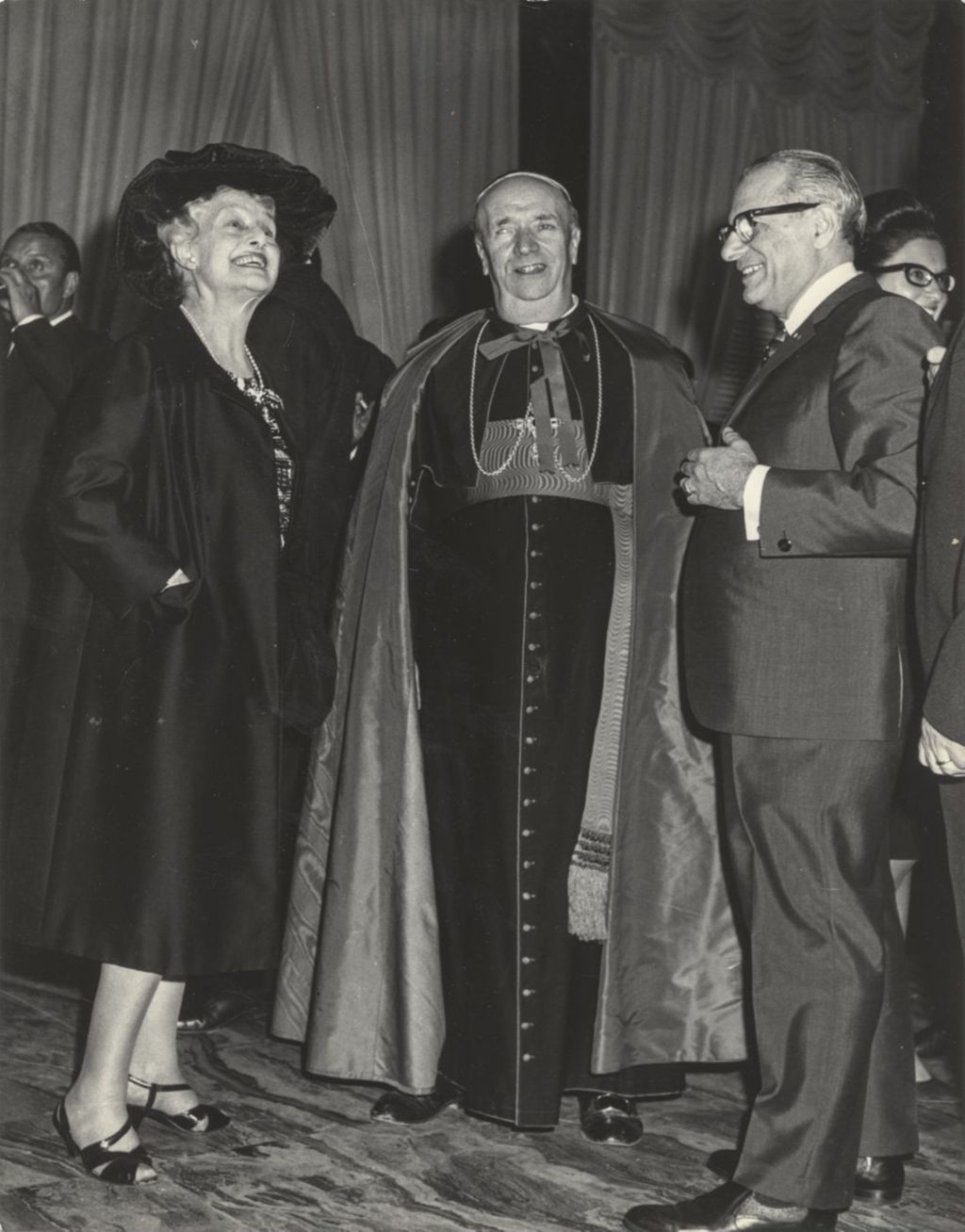 Frank Chesrow, Cardinal Ottaviani and a woman at a reception in Rome
