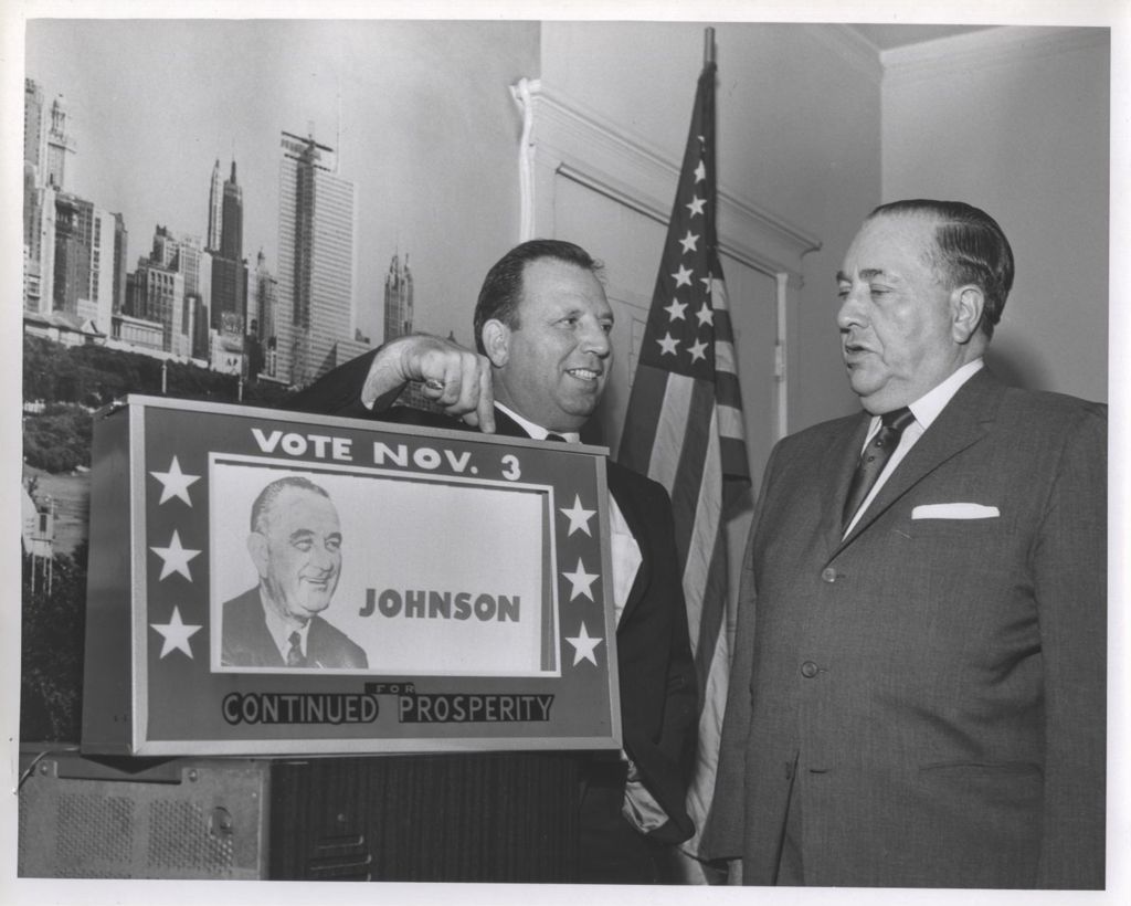 Richard J. Daley reviewing a campaign sign