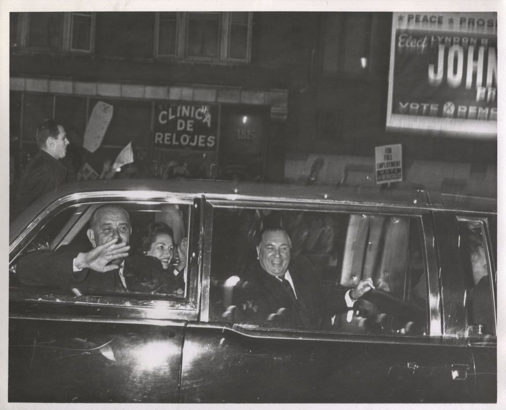 Lyndon B. Johnson and Richard J. Daley riding in a motorcade