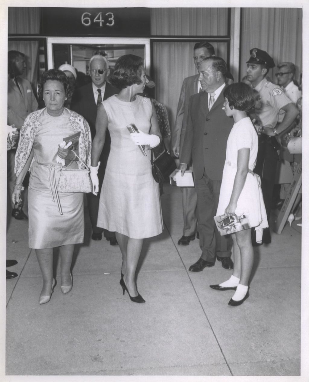 Eleanor Daley and Ethel Kennedy exiting the John F. Kennedy memorial exhibition
