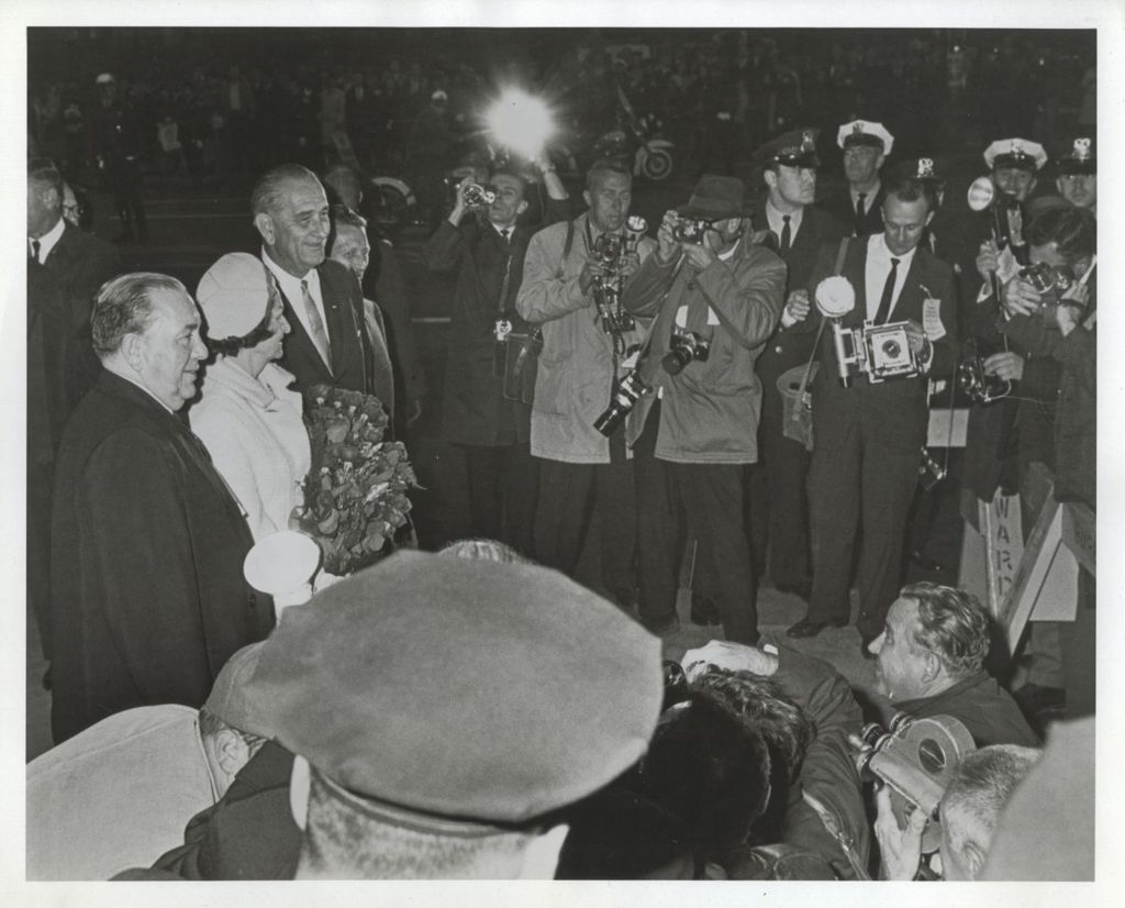 Miniature of Richard J. Daley, Lady Bird Johnson, and Lyndon B. Johnson photographed at a reception