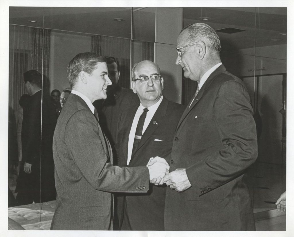 Lyndon B. Johnson greeting guests at a reception