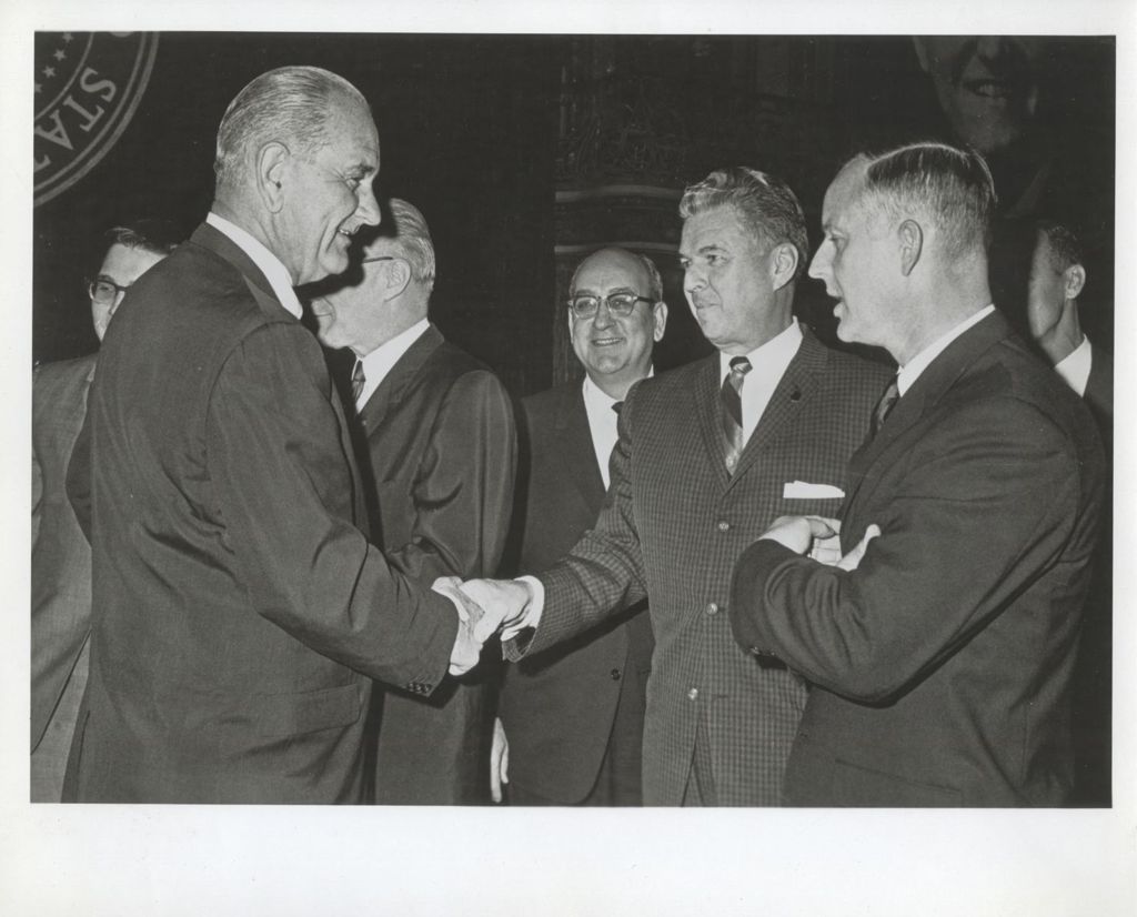 Miniature of Lyndon B. Johnson greeting guests at a reception