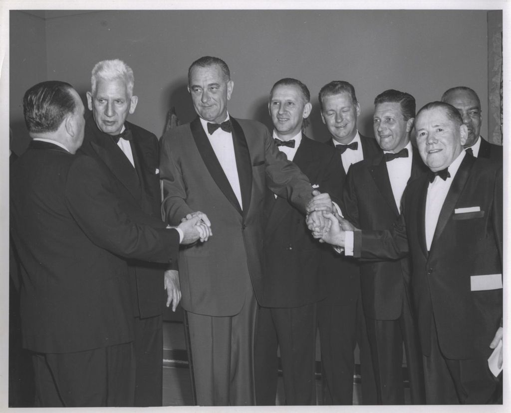 Miniature of Lyndon B. Johnson shaking hands with prominent Illinois politicians