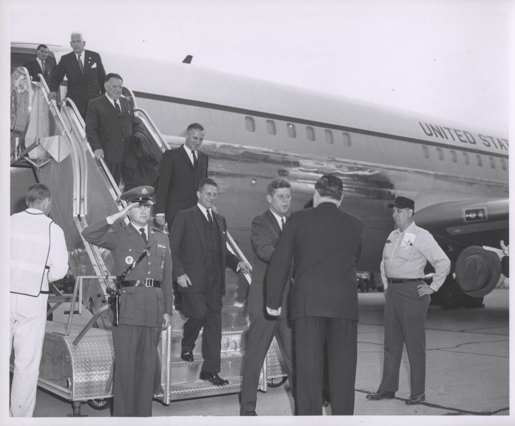 Miniature of Richard J. Daley greets an arriving President John F. Kennedy at the airport