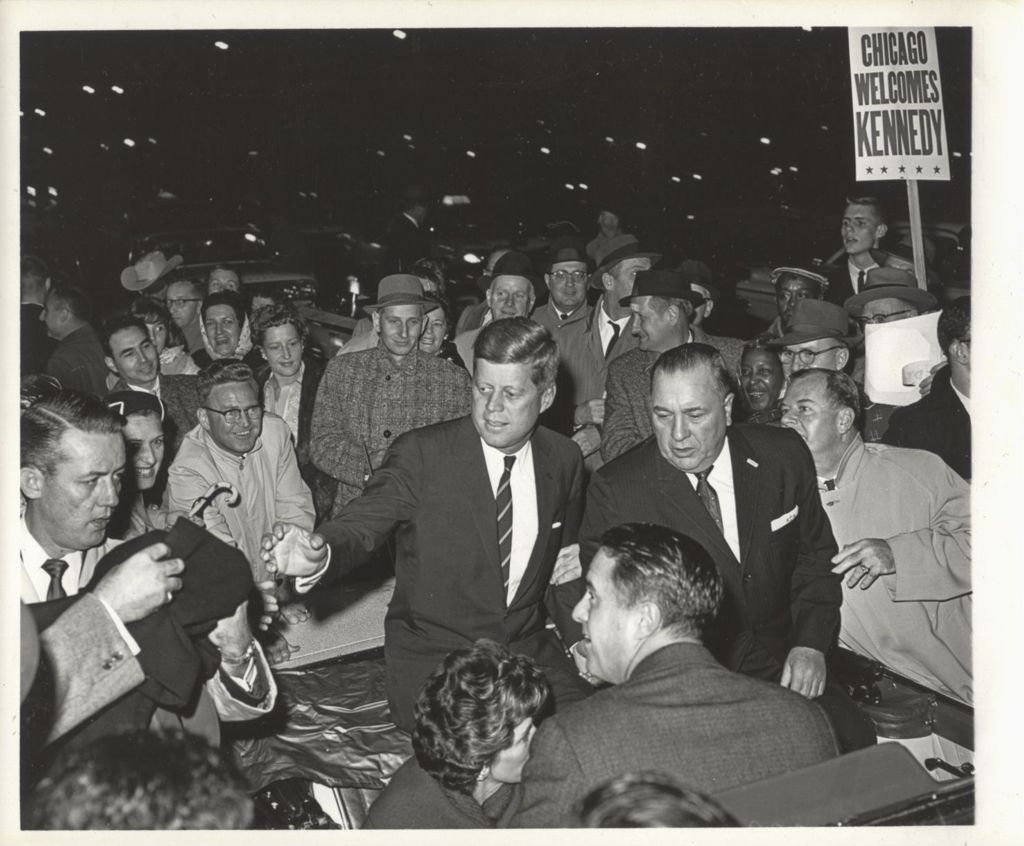 Miniature of John F. Kennedy and Richard J. Daley with Sargent and Eunice Kennedy Shriver in a torchlight parade