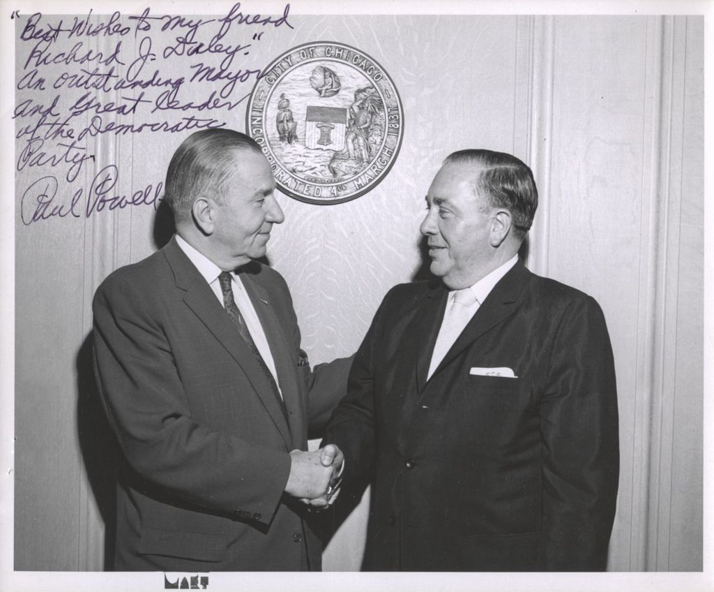 Paul Powell shaking hands with Richard J. Daley