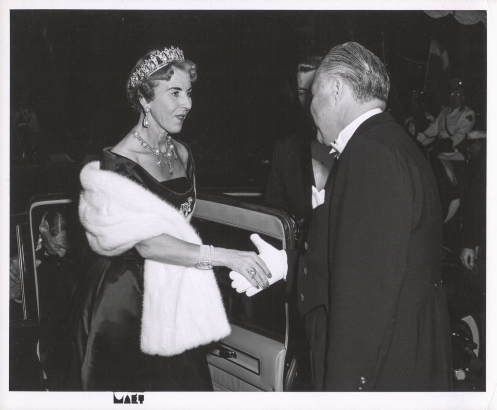 Queen Ingrid of Denmark steps out of her limousine