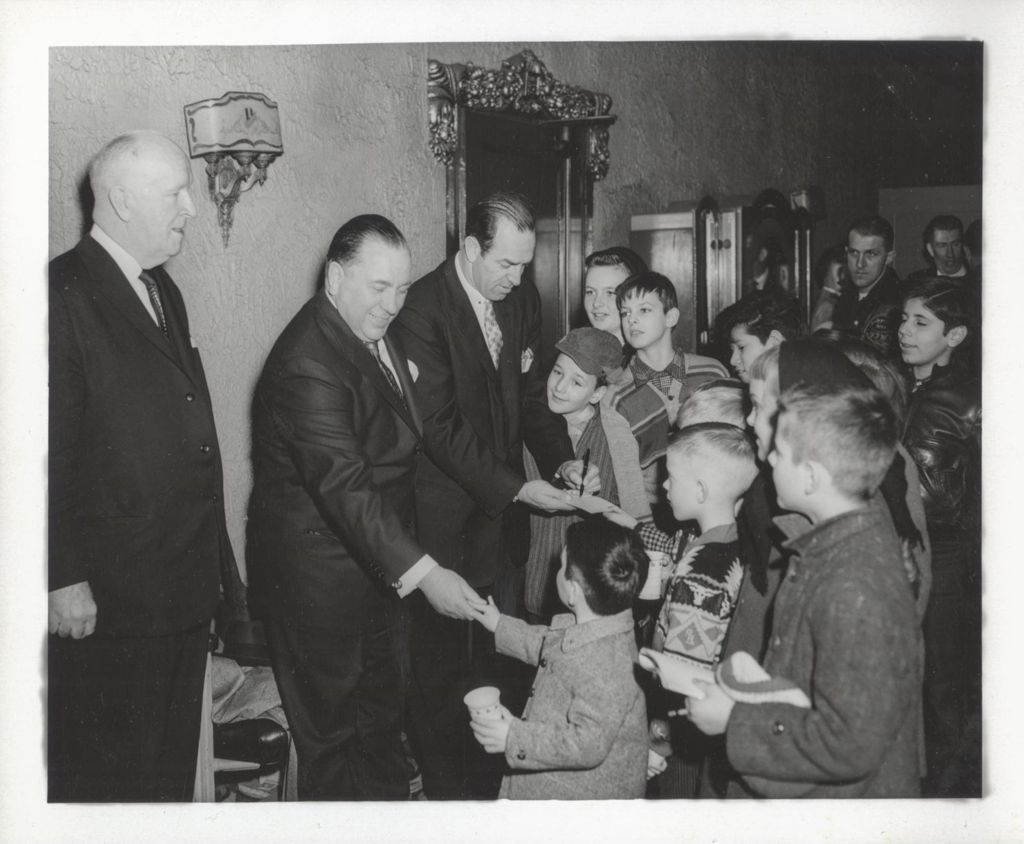 Miniature of Richard J. Daley greeting a group of young boys