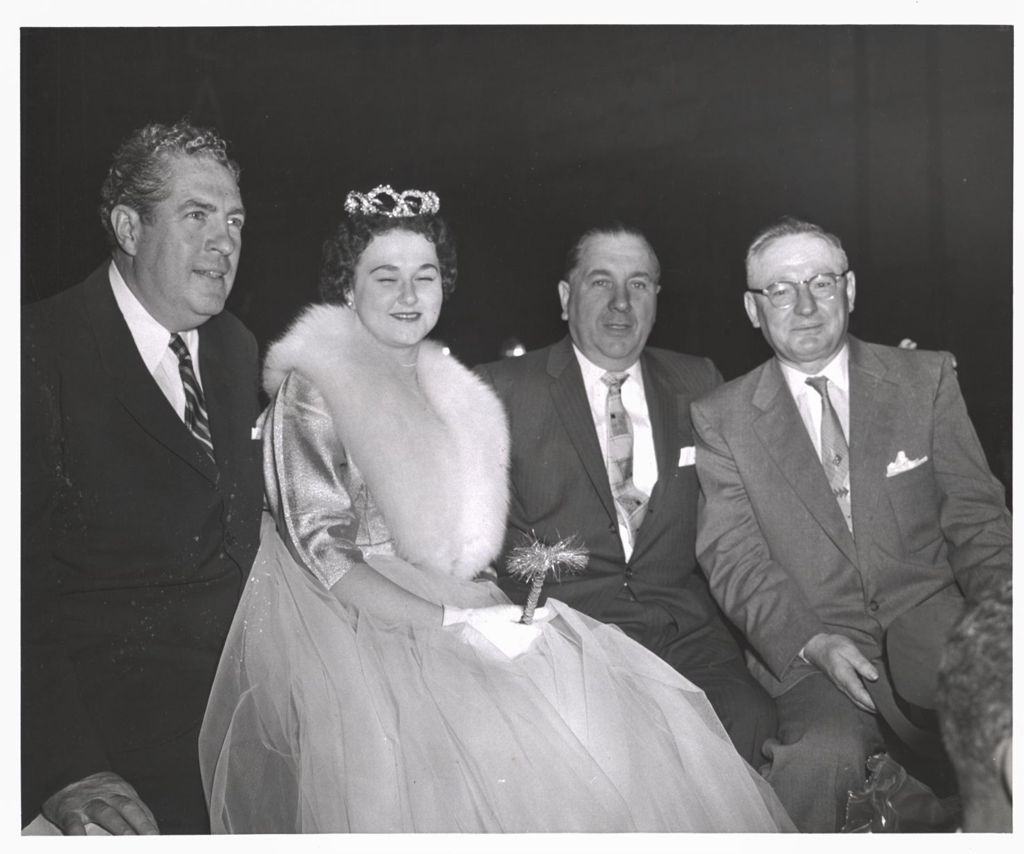 Richard J. Daley and others posing with parade queen