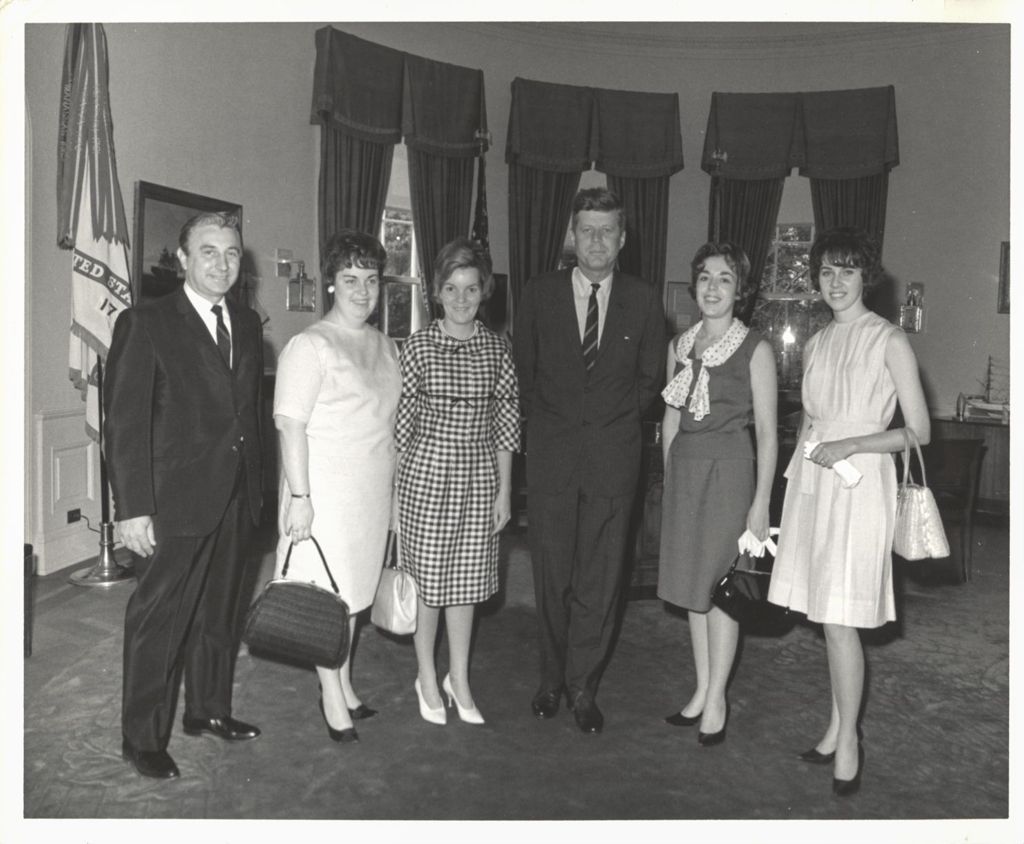 Miniature of President John F. Kennedy with Eleanor R. Daley and others