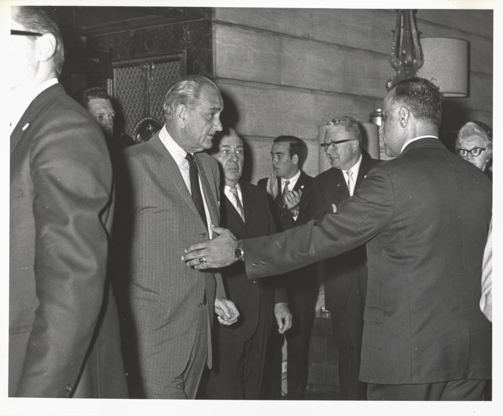 Lyndon Johnson and Richard J. Daley entering a room