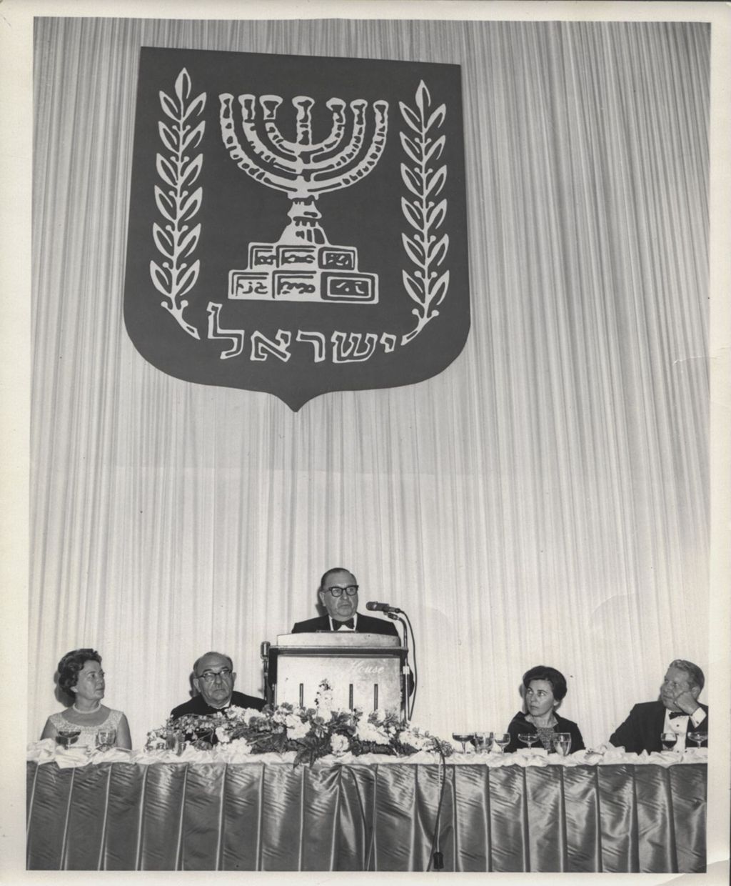 Miniature of Eleanor Daley listening to a speech by Levi Eshkol