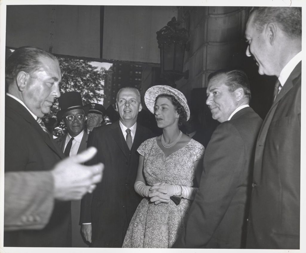Richard J. Daley, William Stratton, Queen Elizabeth II, and others standing outdoors