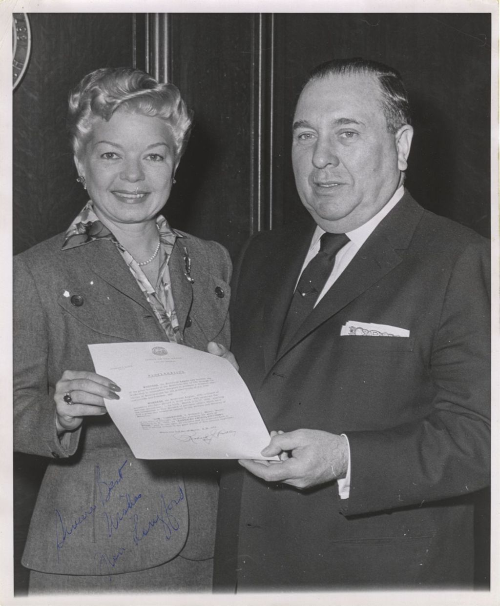 Frances Langford and Richard J. Daley displaying a proclamation