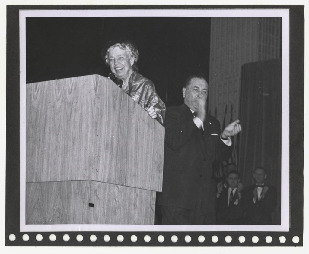 Eleanor Roosevelt and Richard J. Daley standing at a podium