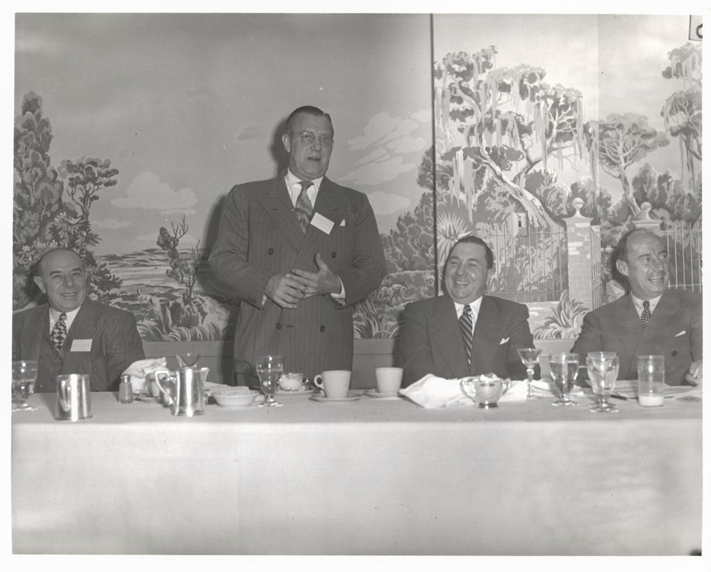 Miniature of Richard J. Daley and Adlai Stevenson enjoying a speaker's talk