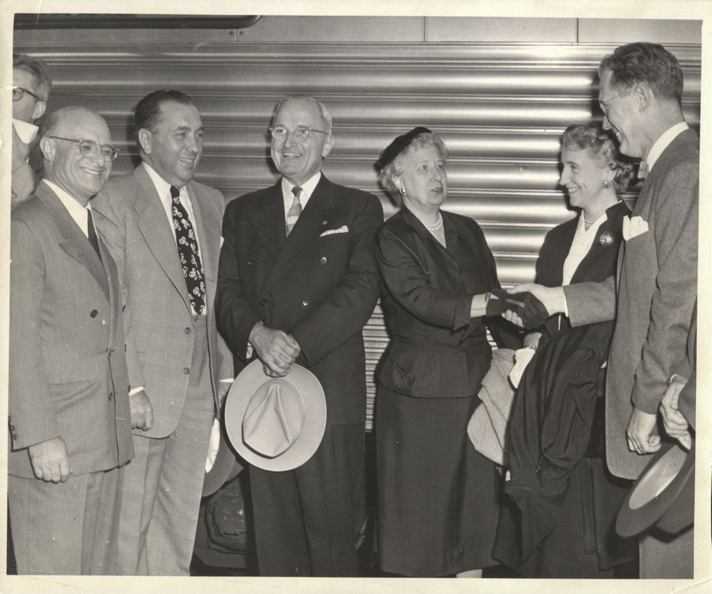 Bess Truman shaking hands with Stephen A. Mitchell