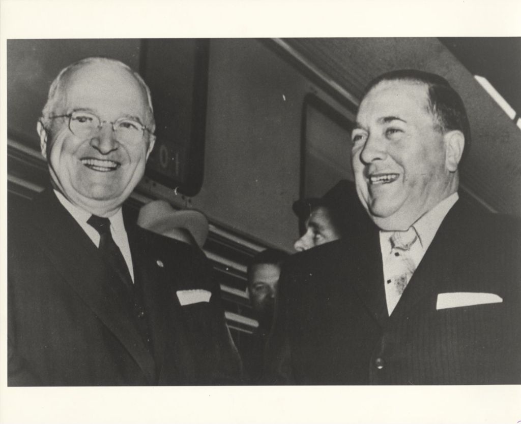 Harry S. Truman standing with Richard J. Daley