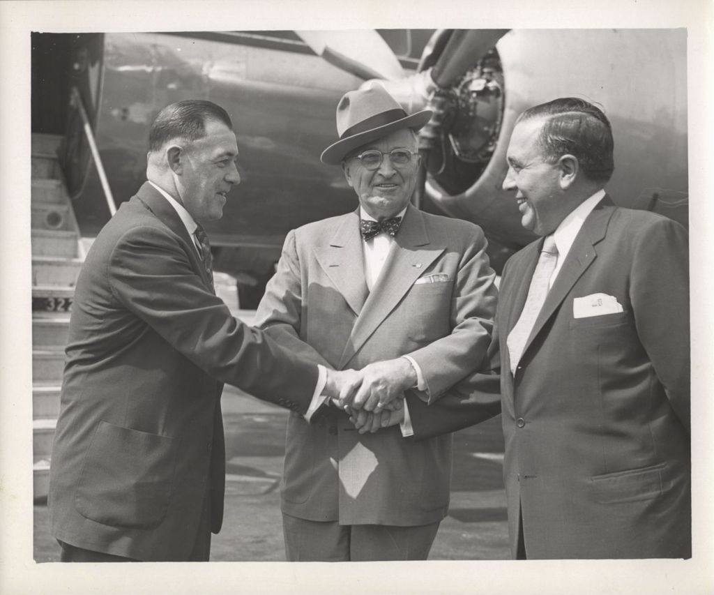 Group handshake with Harry S. Truman