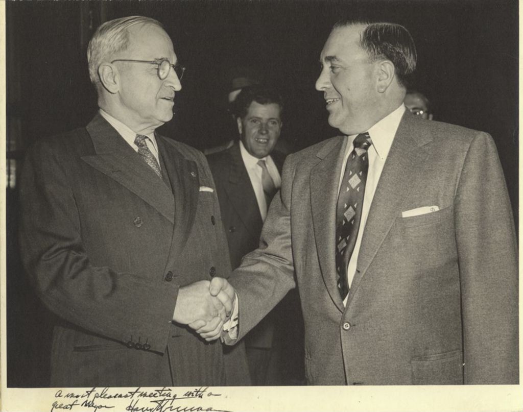Harry S. Truman shaking hands with Richard J. Daley