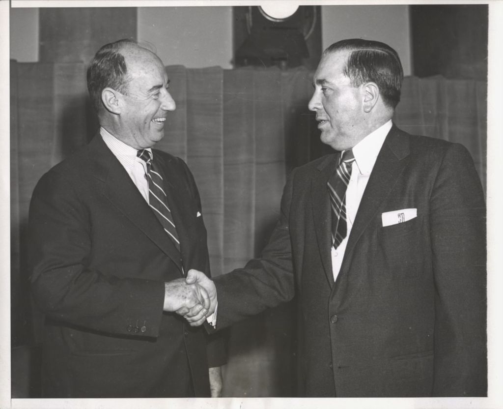 Miniature of Mayor Richard J. Daley shaking hands with Adlai Stevenson