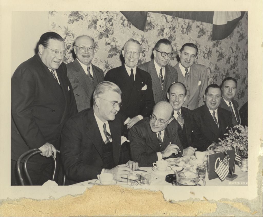 Miniature of Adlai Stevenson II dining with fellow Democrats