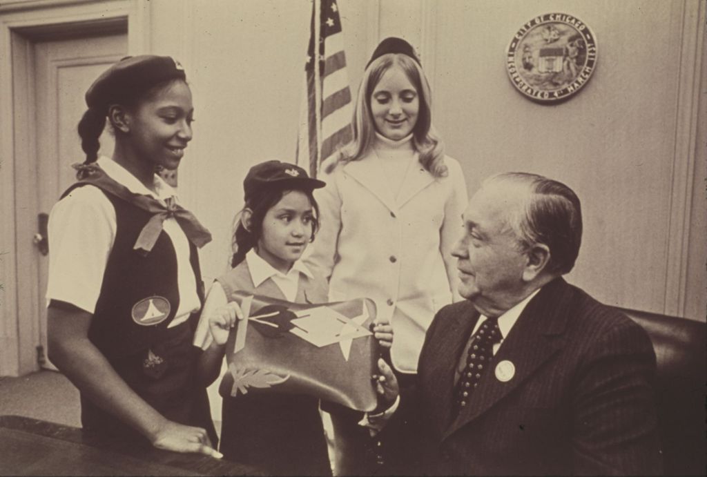 Miniature of Richard J. Daley with girls in uniforms