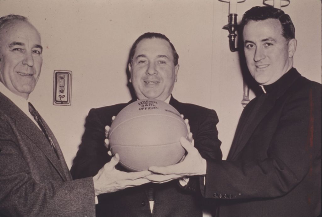 Miniature of Richard J. Daley with a basketball