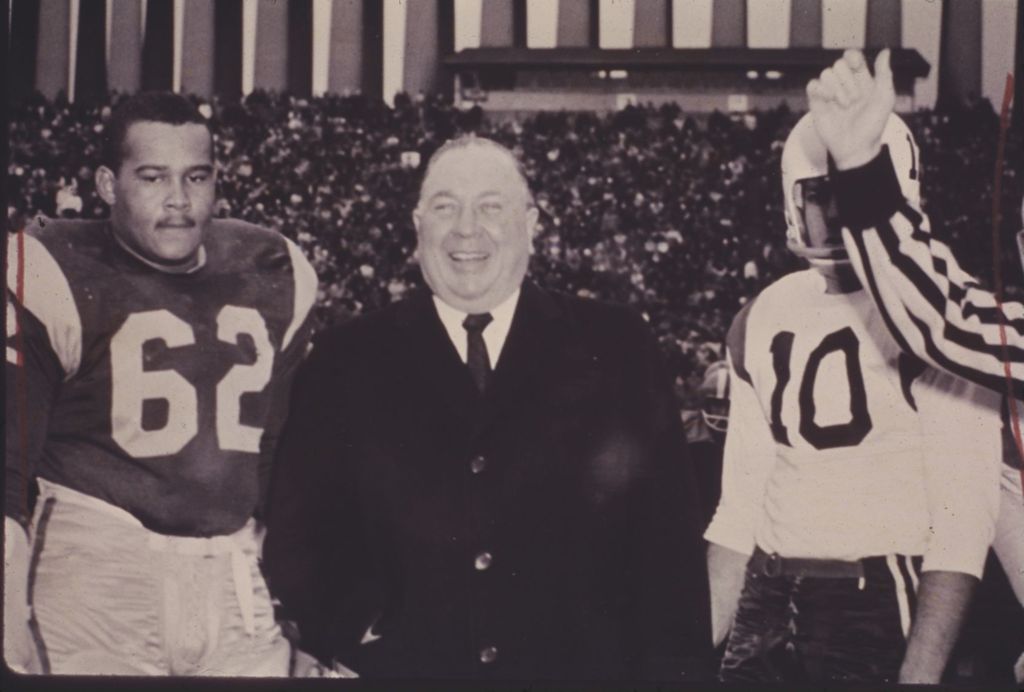 Miniature of Richard J. Daley with football players