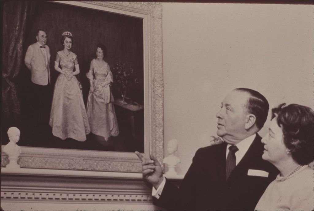 Miniature of Richard J. and Eleanor Daley admire a painting