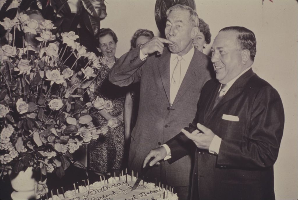 Miniature of Richard J. Daley slices his birthday cake