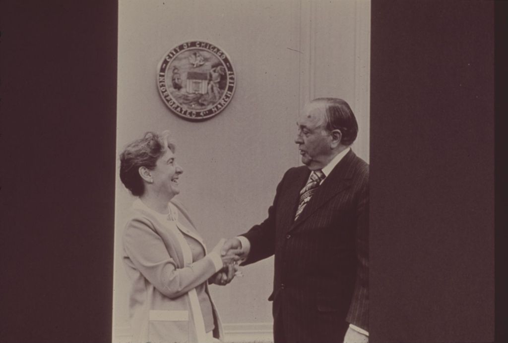 Miniature of Richard J. Daley with a visitor to his office