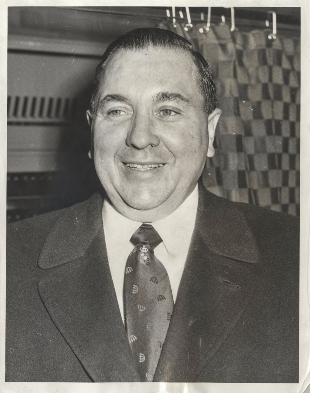 Miniature of Richard J. Daley in front of a voting booth