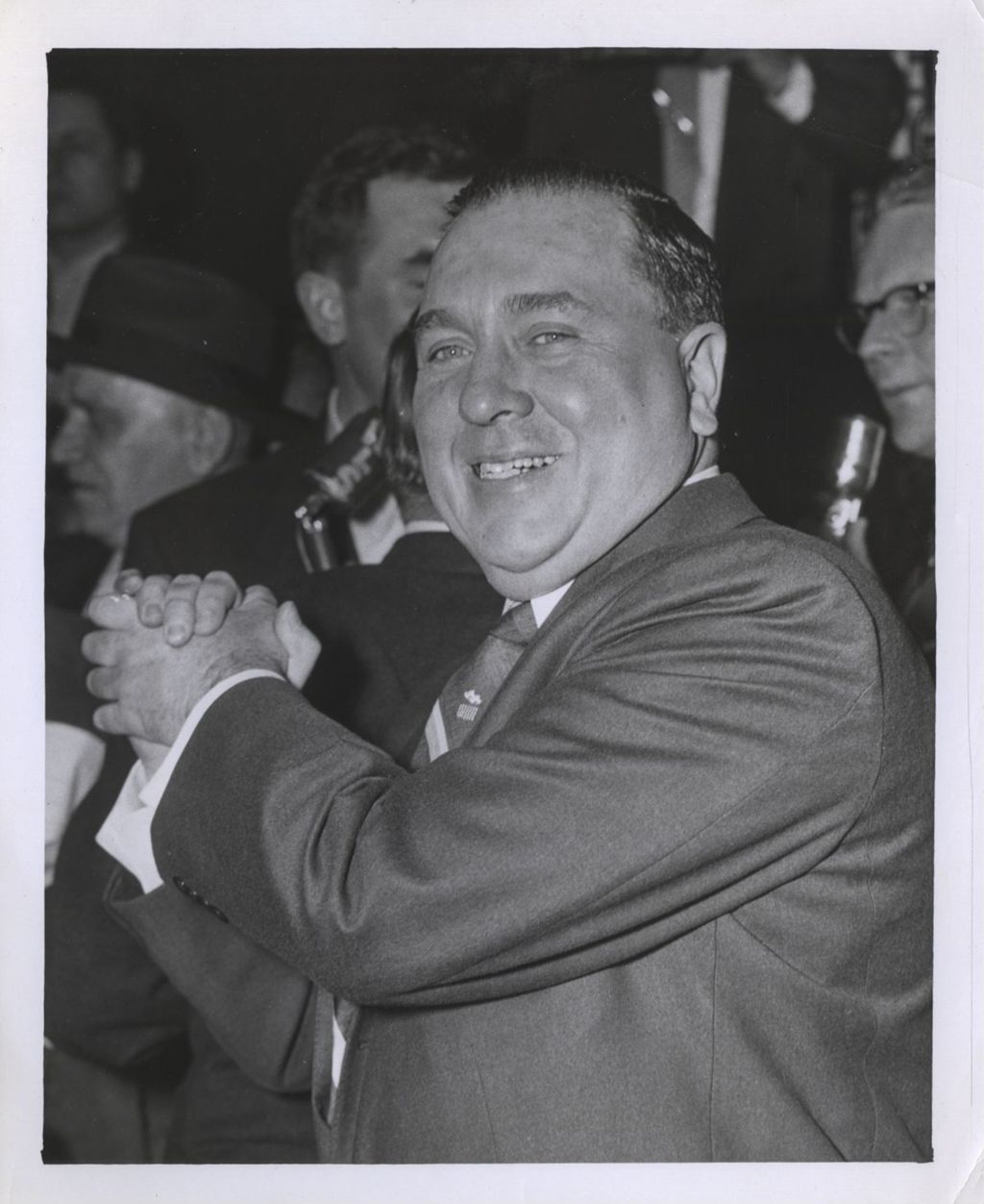 Richard J. Daley with hands clasped