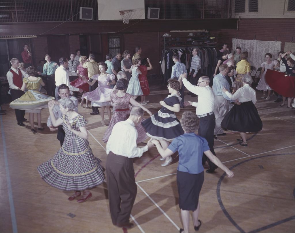 Miniature of Square dancing in a gymnasium