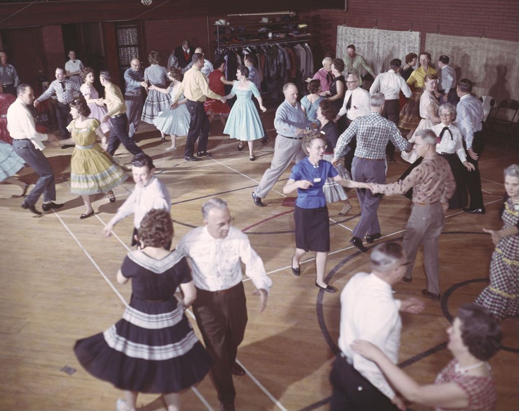 Square dancing in a gymnasium